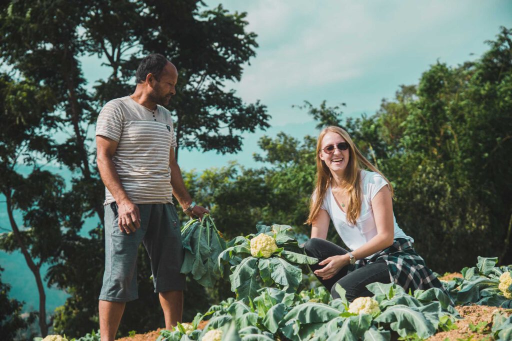 Tourist helping on a farm in Nepal