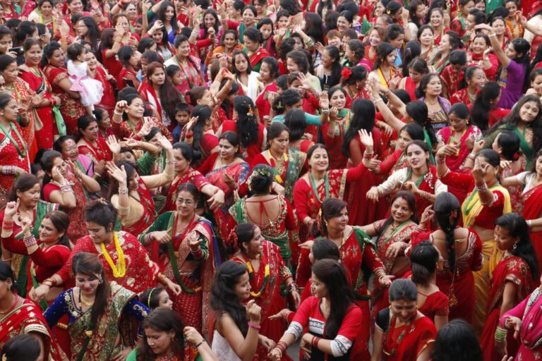 Nepali women dressed in red for Teej festival